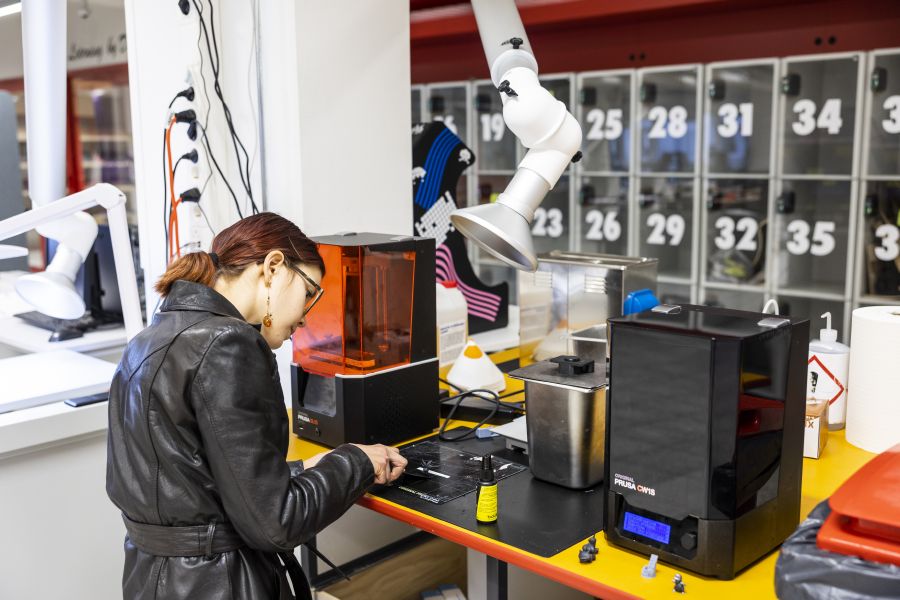 Woman working with SLA printer
