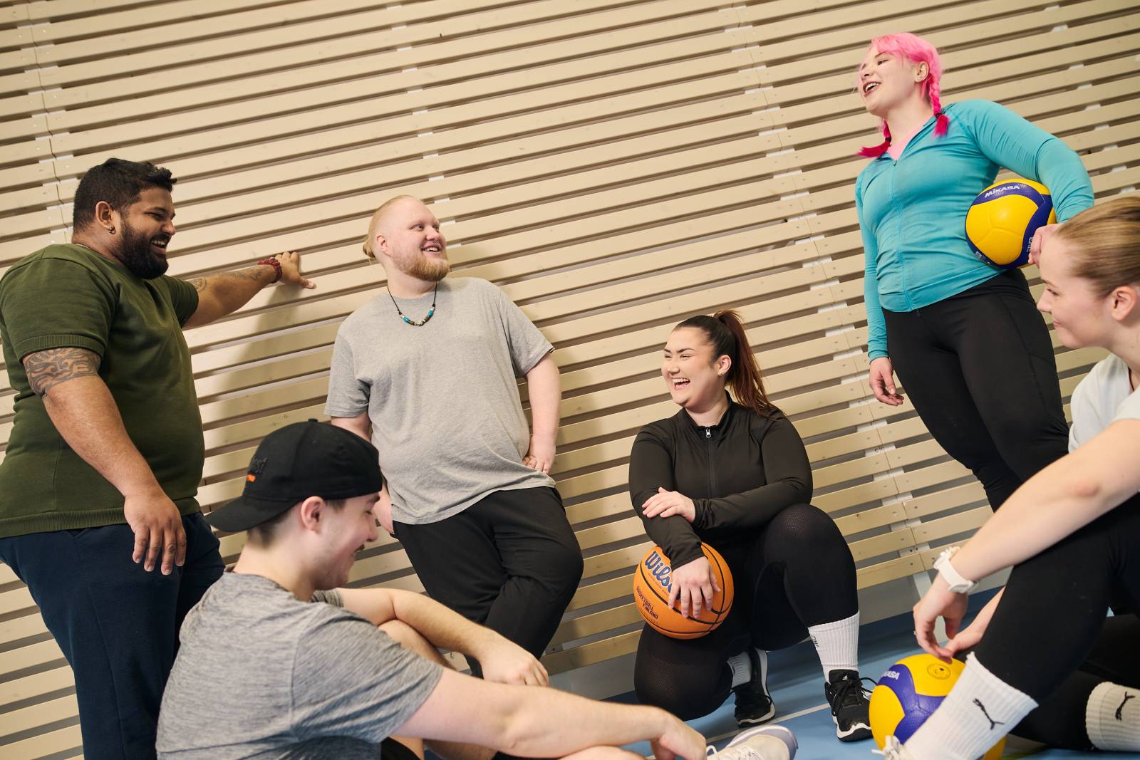 Group of students in ball games room.