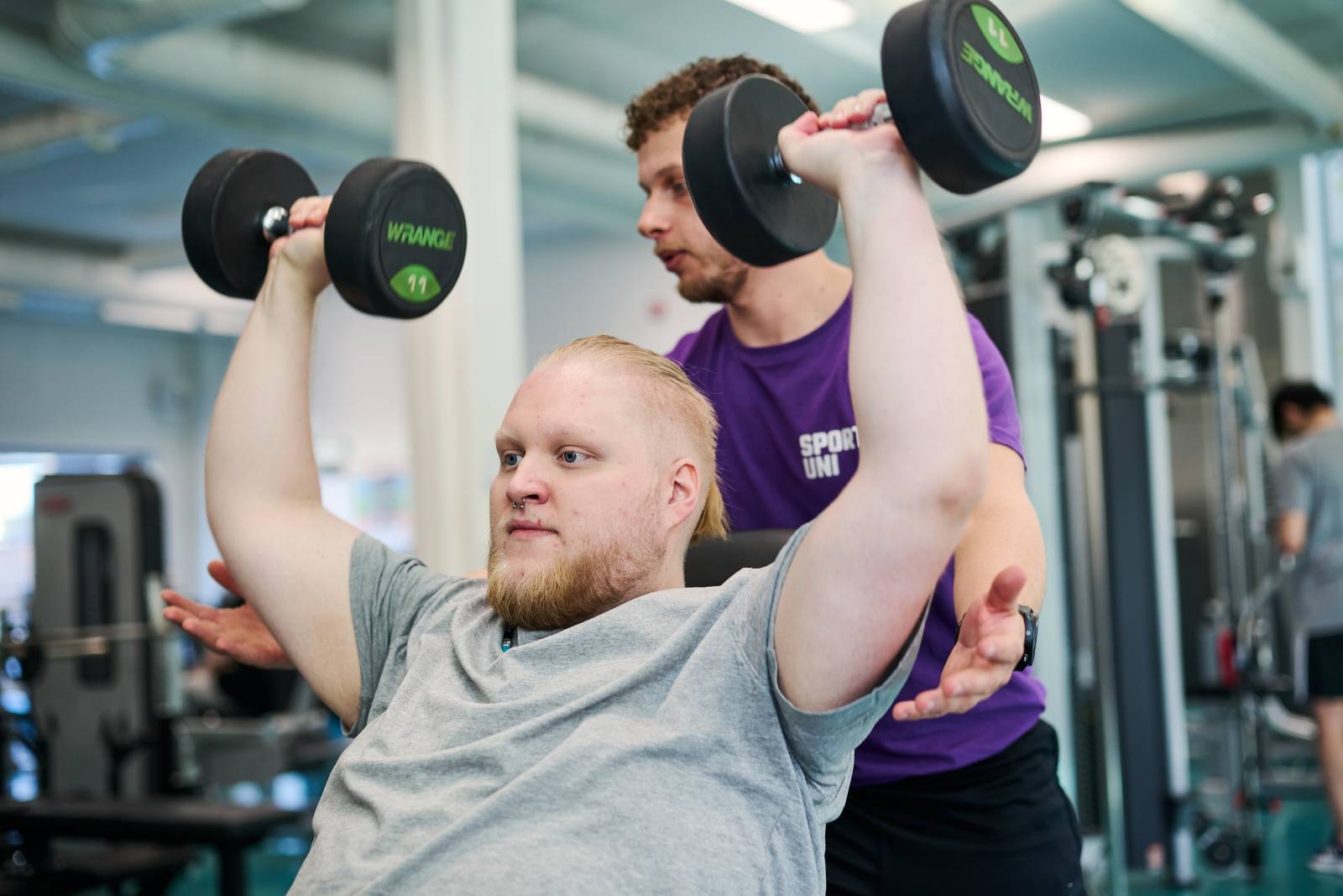 Gym training with coach.