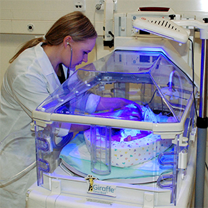 Person training with a neonatal incubator.