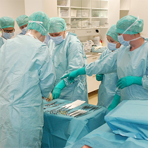 Surgery team practicing operation.