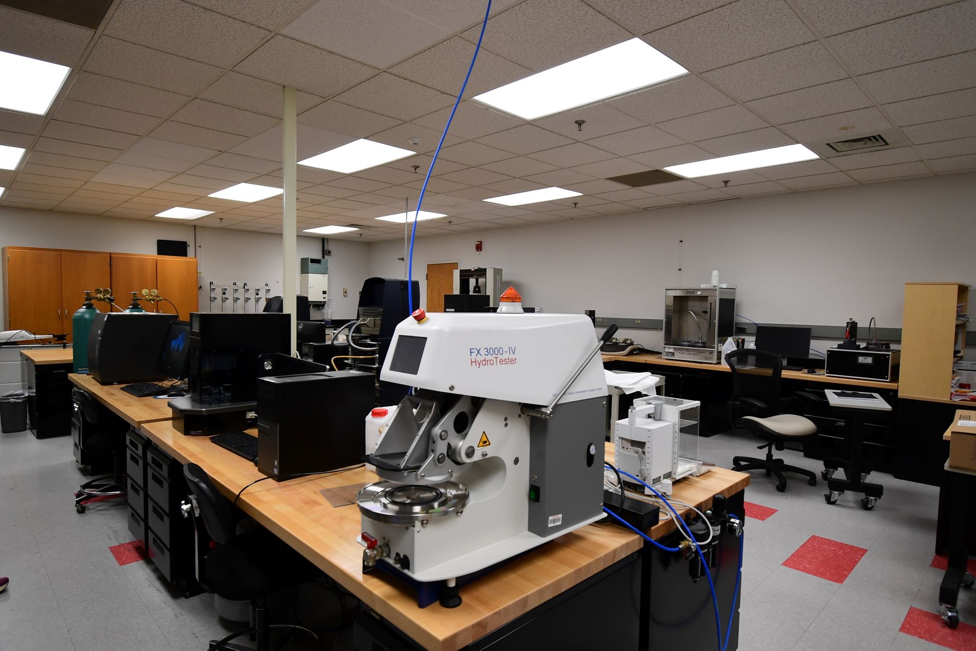 Analytical and physical testing instruments in the laboratory.